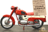 Madžarsko motorno kolo Pannonia 250, ki je bilo glavni dobitek na tomboli Sobote leta 1958. Dobil ga je srečnež iz Brezovec. Fotografija kolesa je simbolična.